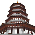 Traditional Multi Tiered Pagoda With Golden Spire Overhanging Eaves And Balconies