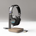 Stylish Black Over Ear Headphones With Wooden Stand And Coiled Audio Cable