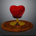 Red Human Heart Organ With Hair Like Support Structures On Wooden Base Platform