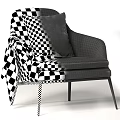 Modern Gray Armchair with Striped Pillow and Plaid Blanket on Black Metal Legs