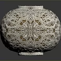 Intricate Spherical Sculpture Carving With Hollow White Patterns And Detailed Design