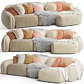 Sectional Sofa with Soft Beige Upholstery Colorful Pillows Fluffy Fur Blanket for Cozy Living Room