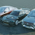 Three Stylish Sedans In Red Black Gray Colors Parked On Stone Pavement Surface