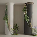 White And Black Decorative Columns With Mirror Accents And Green Plants