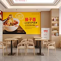 Vibrant Restaurant Interior Featuring Red Walls Food Posters Wooden Tables And Order Counter