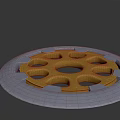 Geared Circular Mechanical Component With Gold Inner Ring And Blue Outer Rim