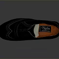 Elegant Black Leather Brogue Shoes With Intricate Carving And Brown Sole