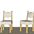 Two Kids Wooden Chairs with Beige Padded Seats Curved Backrests Simple Design for Children's Room