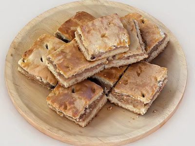 Golden Brown Square Pastry Slices On Wooden Plate With Flaky Layers 3d model