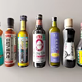 Various Condiment Bottles With Colorful Labels And Diverse Designs Arranged Neatly