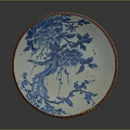Traditional Porcelain Plate With Blue And White Floral Design And Red Rim