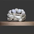 Fresh Garlic Bulbs in Wicker Basket on Wooden Cutting Board Against Black Background