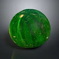 Fresh Green Watermelon With Round Shape And Smooth Rind On Dark Surface
