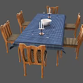 Dining Table Set Blue Checkered Tablecloth With White Bowl Candles And Wooden Chairs Striped Seats