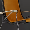 Modern Orange Leather Lounge Chair With Wooden Armrests And Metal Frame Design