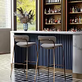 Elegant Bar Area With Marble Countertop Gray Stools Gold Metal Legs And Wine Cabinets