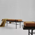 Brown Fabric Sofa Bench With Black Metal Frame And Yellow Throw Blanket