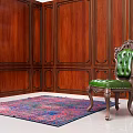 Elegant Green Velvet Single Sofa in Room with Wooden Paneled Walls and Colorful Rug
