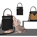 Three Stylish Handbags Featuring Black Leather And Patterned Designs With Handles And Straps