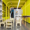 Bright Book Art Space With Yellow Walls And Circular Cutouts