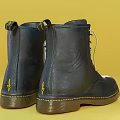 Navy Blue Leather Boots With Yellow Laces And Yellow Stitching On Sole