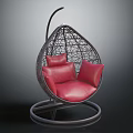 Modern Teardrop Rattan Hanging Chair With Red Cushions And Circular Base