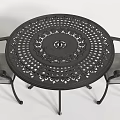 Outdoor Table with Ornate Metal Design and Matching Chairs Gray Cushions
