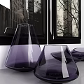 Purple Ceramic Vessels Vase And Plates By Window With City Buildings View