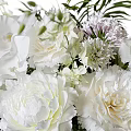 White Peony And Calla Lily Arrangement In Clear Glass Vase With Fresh Greenery