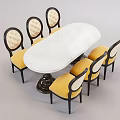 Six Chair Dining Table Set With Oval White Marble Top Wicker Backrests And Yellow Cushions