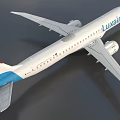 Luxair Airplane With White Body Red And Blue Tail Wings And Engine