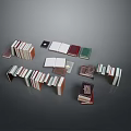 Various Colored Electronic E Readers in Different Sizes Open and Stacked on Gray Background