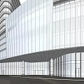 Modern Office Building With Glass Curtain Wall In Urban Commercial Area With Pedestrians And Vehicles