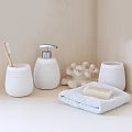 Minimalist White Bathroom Essentials With Toothbrush Holder Soap Dispenser Towel Soap Bar And Coral Decoration