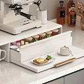 Cozy Kitchen Counter With White Microwave Coffee Machine Small Dolls Photo Frame And Condiments