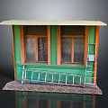 Small Green Building Exterior With Two Windows Wooden Frames Awning Metal Railing And Patterned Mat