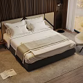 Double Bed in Modern Bedroom with White Pillows Sheets Gray Runner and Beige Chair