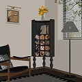 Dark Chest of Drawers with Decorative Circular Patterns Topped with Vase and Flowers