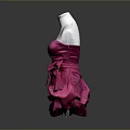 Pink Strapless Ruffled Dress With Bow Accent Displayed On White Mannequin