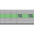 Gray Modular Building Unit With Green Stripe Door And Staircase Structure