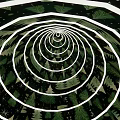 Commercial Landscape Design Featuring Spiral Conical Art Installations And People In Open Space