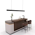 Modern Kitchen Island With Dark Countertop Bar Stools And Hanging Light