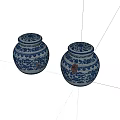 Pair of Blue and White Ceramic Jars with Decorative Lids and Intricate Patterns