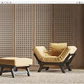 Cozy Single Sofa With Ottoman On Light Rug And Wooden Perforated Wall