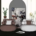 Soft Toned Bean Bag Chairs with Abstract Art and Indoor Plants in Modern Interior