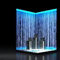 Modern Waterfall Display With Blue Lighting And Decorative Glass Bottles