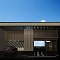 Modern Entrance Gate Design With Vertical Grille Circular Paving Car And Blue Sky Background