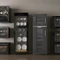 Modern Black Glass Door Kitchen Appliances Including Oven Refrigerator Sterilizer Arranged Against Wall