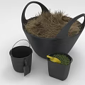 Black Gardening Containers Including Hay Filled Basket Small Buckets With Green Grass And Yellow Tool