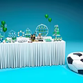 Decorated Dining Table With White Tablecloth Desserts Drinks Green Balloons And Soccer Ball